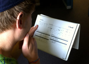 Paul Graff Reads a Printed Hudl Summary Report